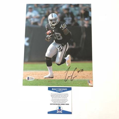 TJ Carrie signed 8x10 photo BAS Beckett Oakland Raiders Autographed